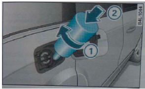 Rys. 2 2 0 Króciec wlewu AdBlue: wkładanie butli do napełniania
